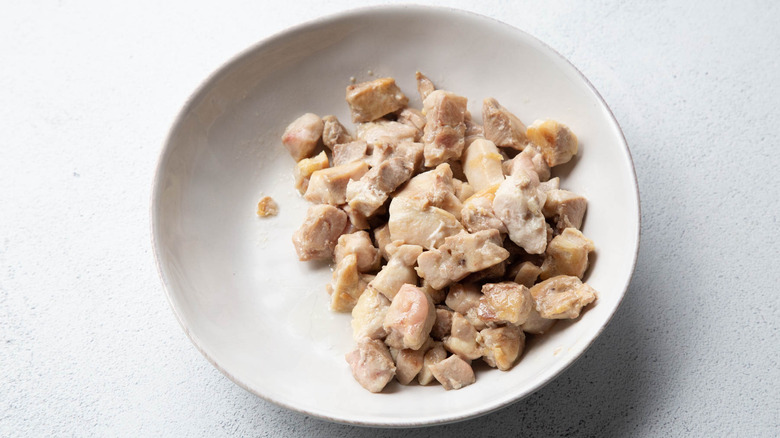 chicken chunks in a white bowl