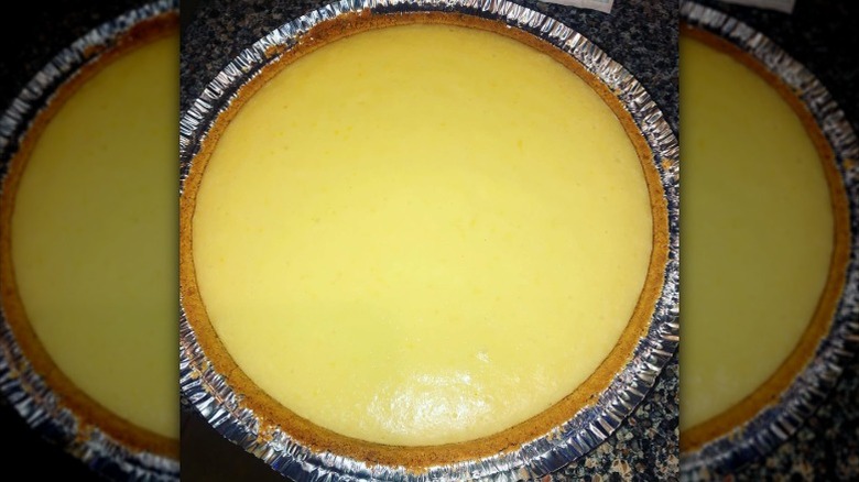 Lemon icebox pie placed on a marble table