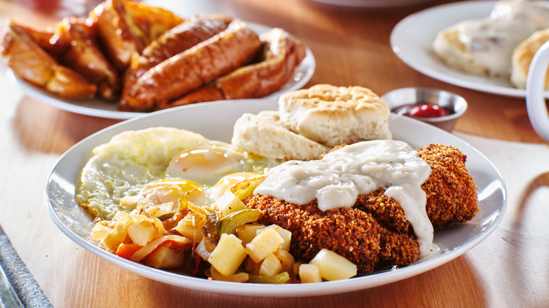 A plate of chicken fried steak and eggs