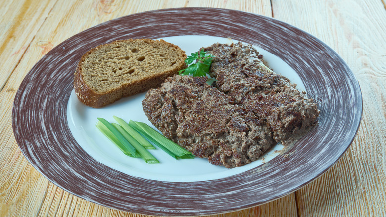 livermush on a plate with bread