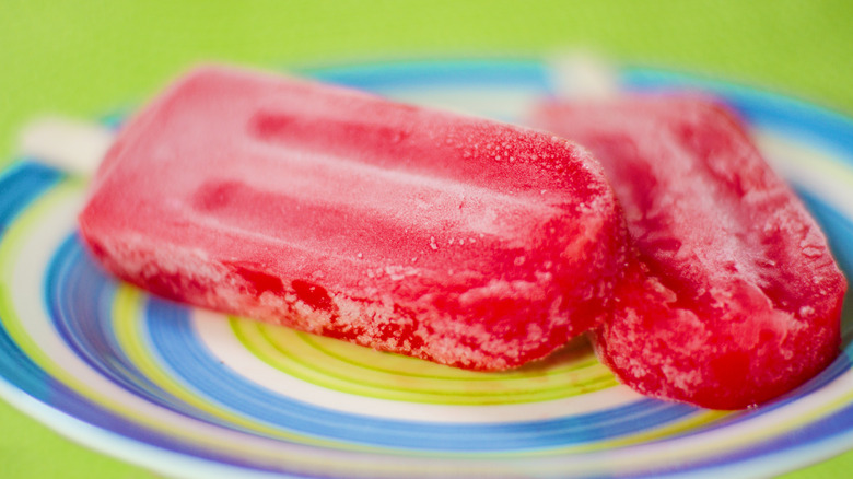 Two red popsicles