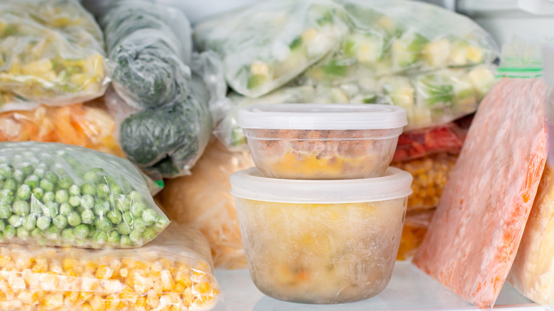 Different frozen foods in freezer