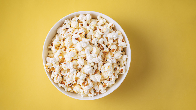 Popcorn on yellow background