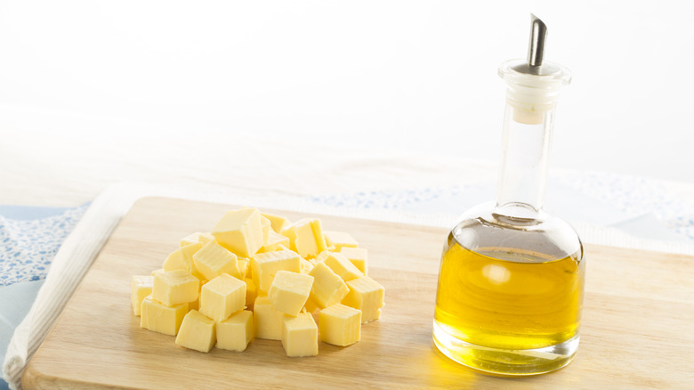Butter and oil on a cutting board