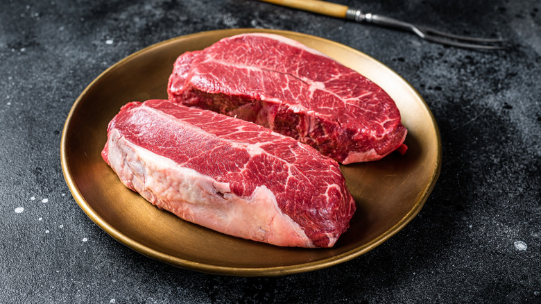Raw blade steaks