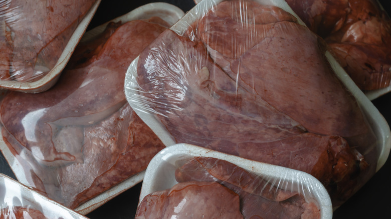 Raw beef lungs on white styrofoam trays