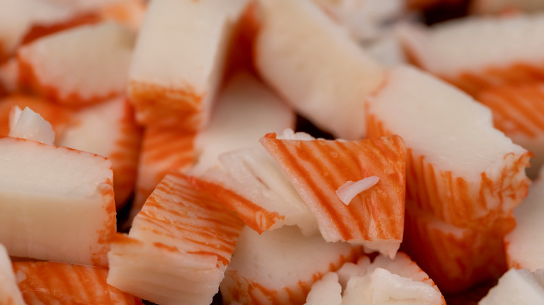 A plate of imitation crab cut up into small pieces