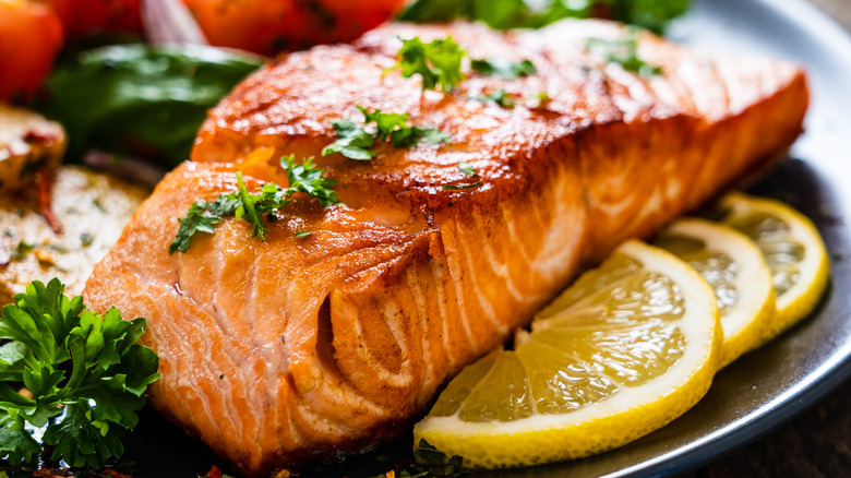 Salmon filet with fresh lemon slices