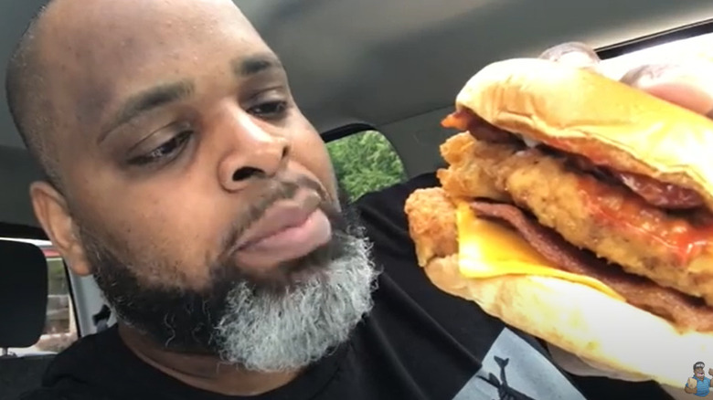 Man holding a chicken Baconator