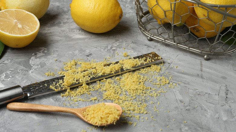 Lemons with zester and zest