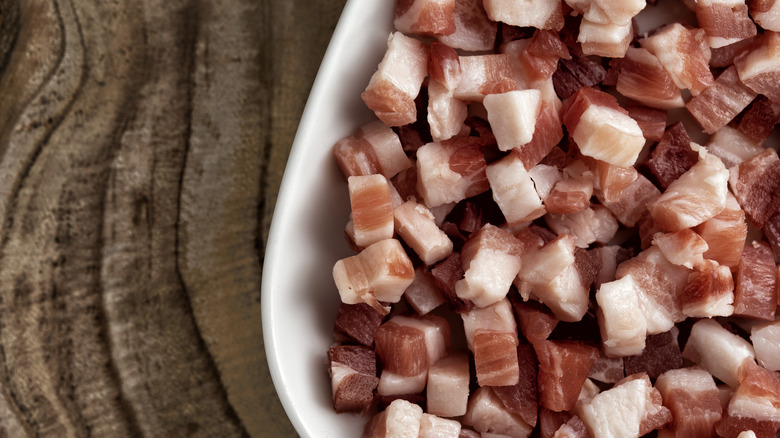 Italian chopped pancetta on board