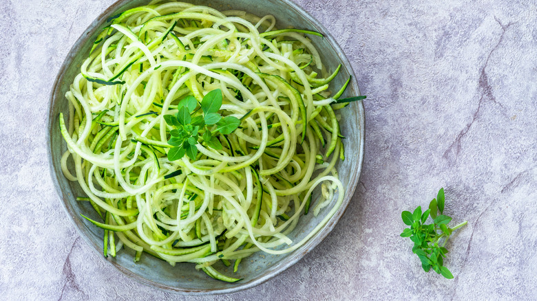 Shredded zucchini in a bowl