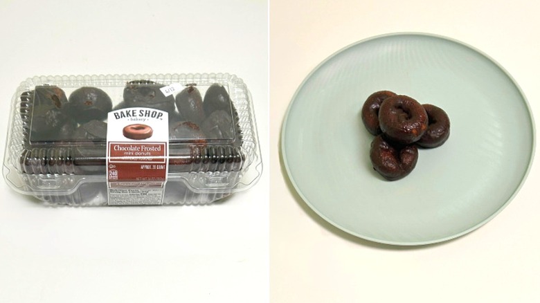 A box of Bake Shop Chocolate Frosted Donuts next to a blue plate with chocolate mini donuts