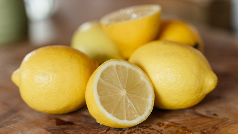 Sliced lemons on a cutting board