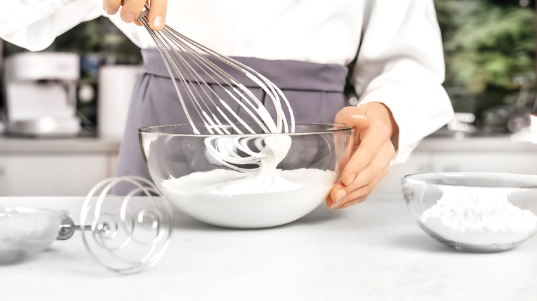 Chef whisking cream