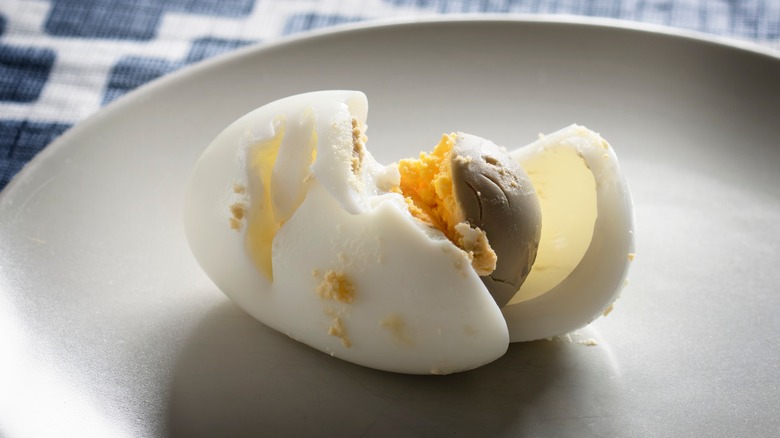 boiled egg with green yolk