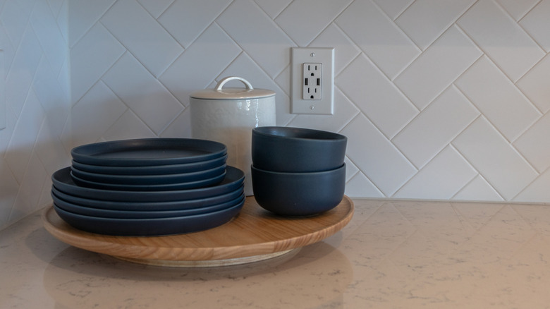 Lazy Susan holding dishes on kitchen counter