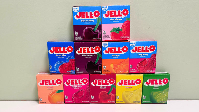 Eleven packs of Jell-O in different flavors stacked like a pyramid