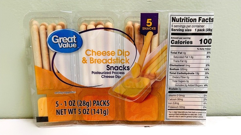 A package of Great Value Cheese Dip and Breadstick Snacks against a green and white background