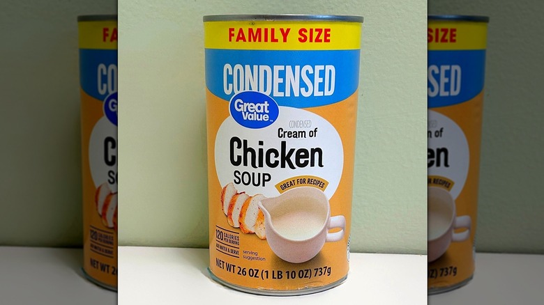 A can of Great Value Condensed Cream of Chicken Soup against a green and white background