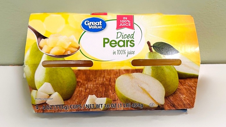 A pack of Great Value Diced Pears on a green and white background