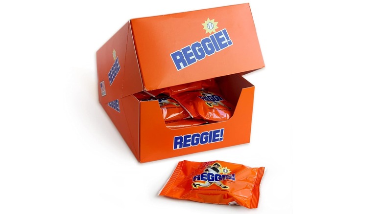 A box of Reggie Bars, with a single Reggie Bar sitting in front of it
