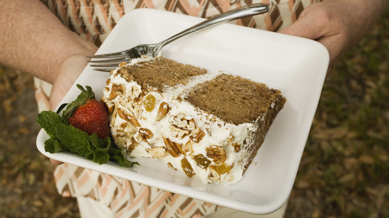 A slice of Lady Baltimore cake with white icing layers