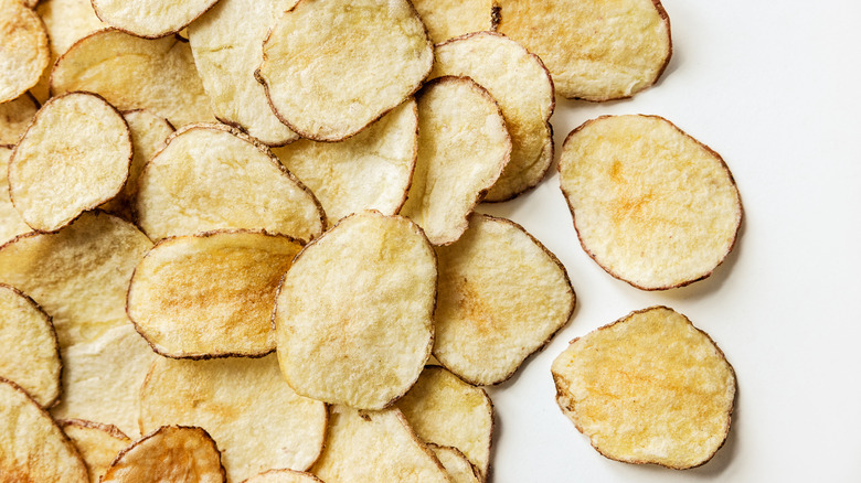 A pile of loose potato chips