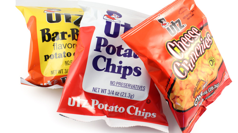 Bags of BBQ, Original, and Cheese Crunchies Utz.