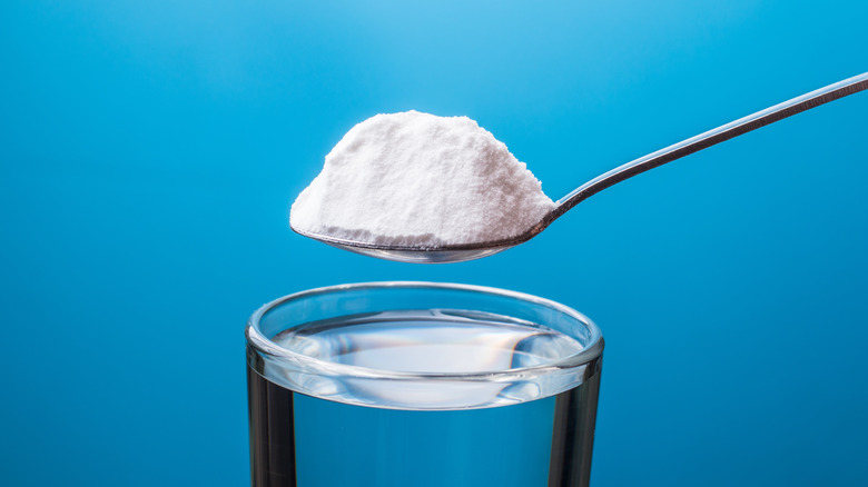 Spoon of soda and water