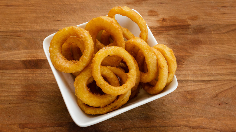 Onion rings in rectangular bowl