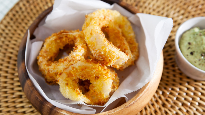 Air fried onion rings in bowl