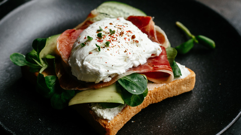 A poached egg on ham