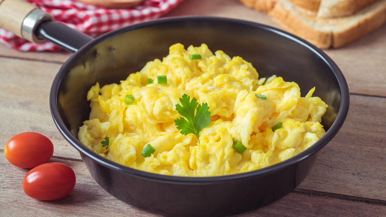 Frying pan of scrambled eggs