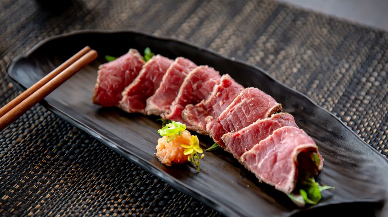 Beef tataki with chopsticks