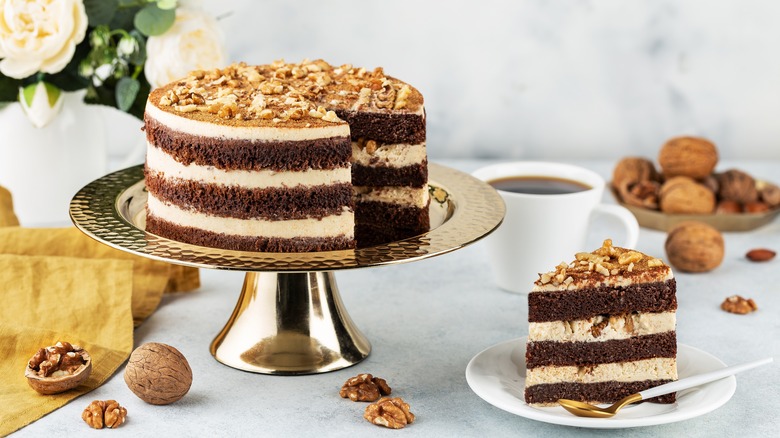 chocolate cake topped with nuts