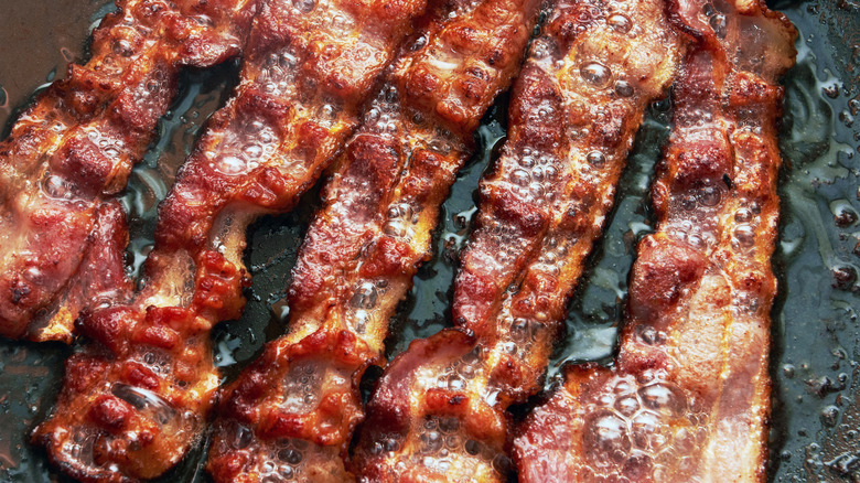 cubed bacon in wooden bowl