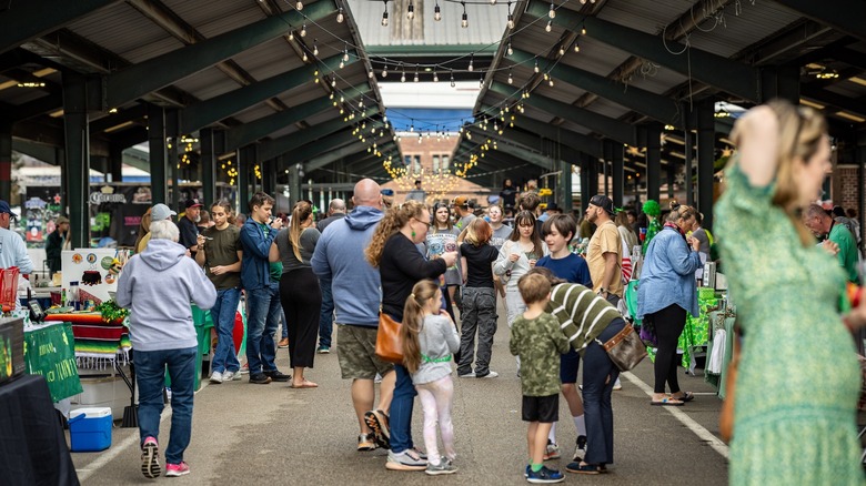 Crowd of shoppers inside Capitol Market