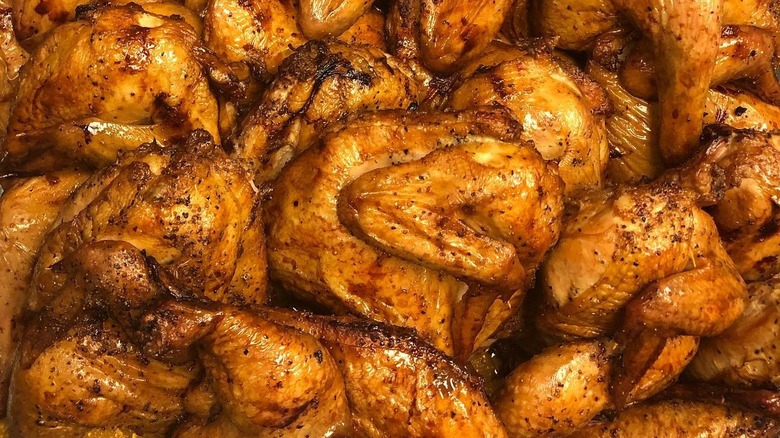 Barbecue whole chickens