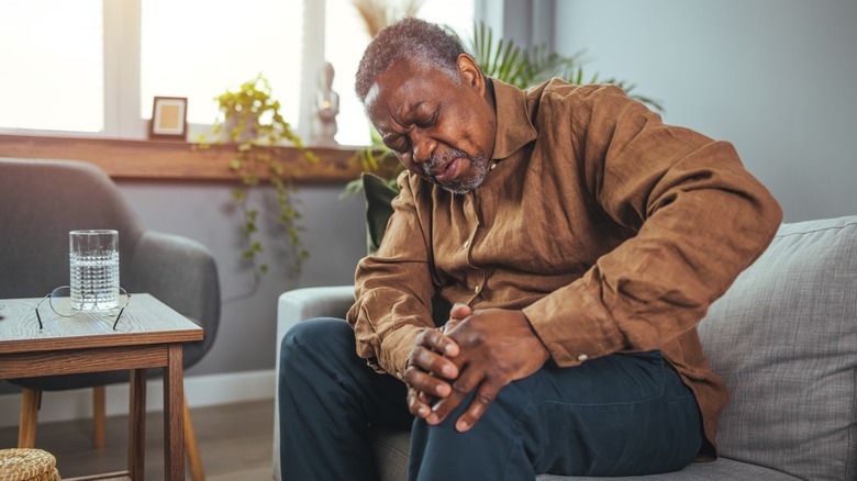 Older man with knee pain