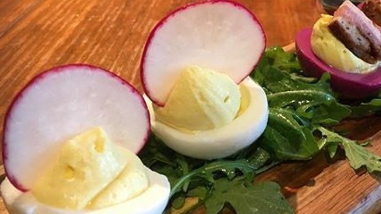 Deviled eggs with radish