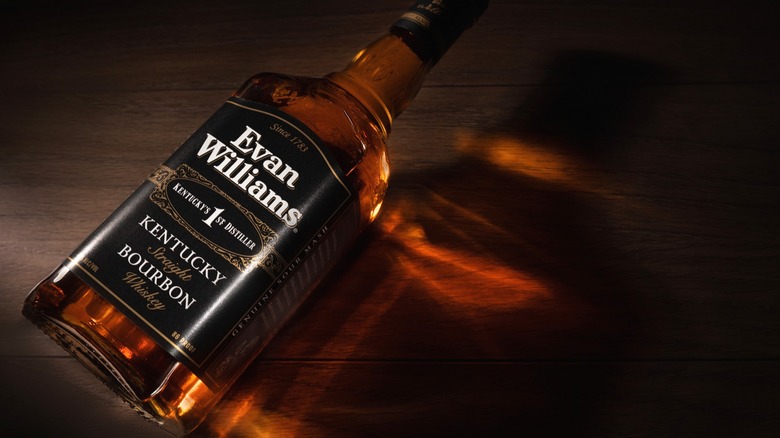 A bottle of Evan Williams lying on table