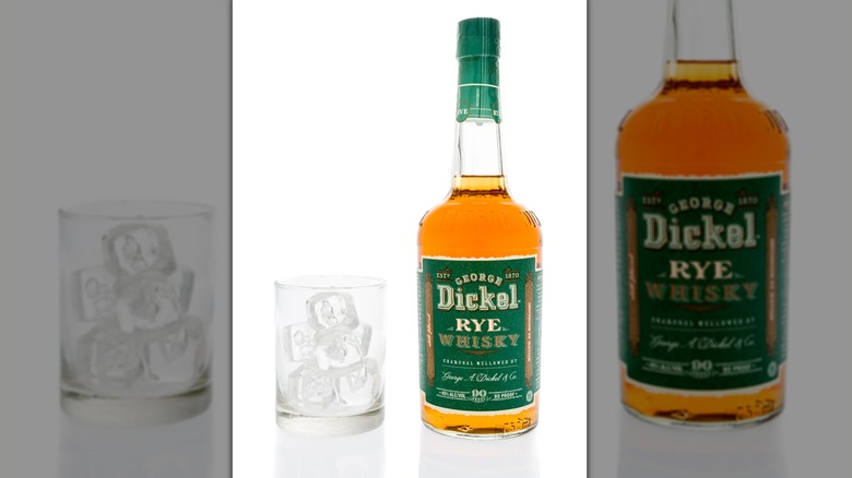 A bottle of Dickel Rye and a glass of ice