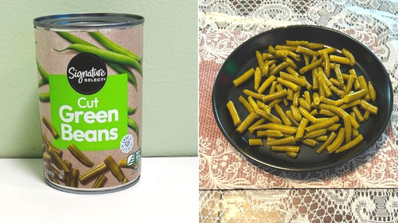 A can of Signature Select Cut Green Beans beside a black plate of green beans