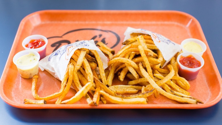 Dick's Drive-In fries and dips on tray