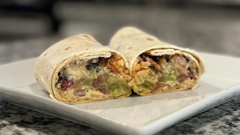 cut open plated fiesta burrito