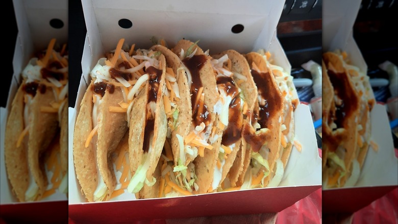 Cardboard takeout box with six tacos