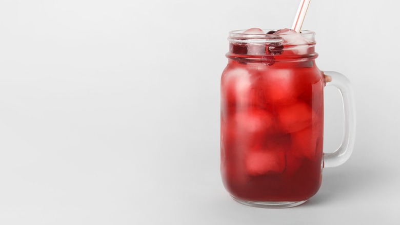 Mason jar mug of cranberry juice