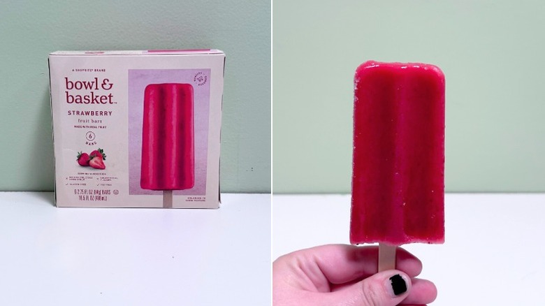 A box of Bowl and Basket Strawberry Fruit Bars next to a popsicle