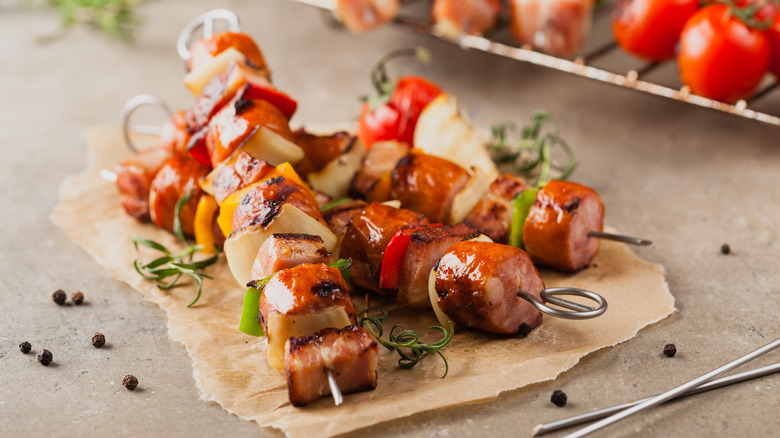 hot dogs and vegetable skewers